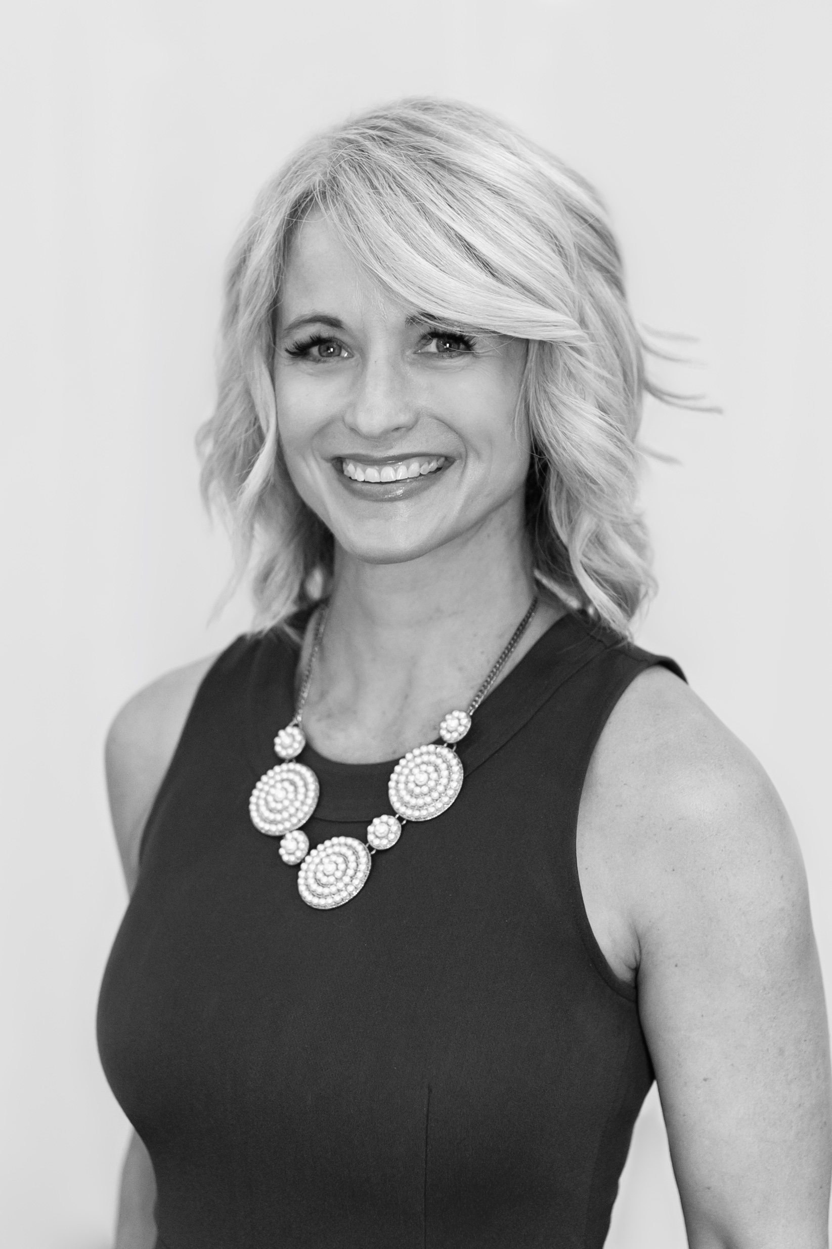 Stacey Nusbaum smiling in a portrait